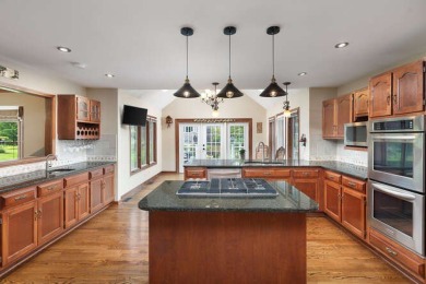 Welcome to this exquisite home nestled down a tree-lined street on White Eagle Golf Club in Illinois - for sale on GolfHomes.com, golf home, golf lot