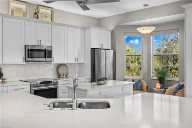 Corner end-unit, second-floor coach home filled with natural on Windstar on Naples Bay in Florida - for sale on GolfHomes.com, golf home, golf lot