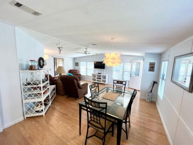 Welcome to this beautifully maintained 2-bedroom, 2-bath home in on Pine Lakes Country Club in Florida - for sale on GolfHomes.com, golf home, golf lot