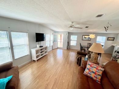 Welcome to this beautifully maintained 2-bedroom, 2-bath home in on Pine Lakes Country Club in Florida - for sale on GolfHomes.com, golf home, golf lot