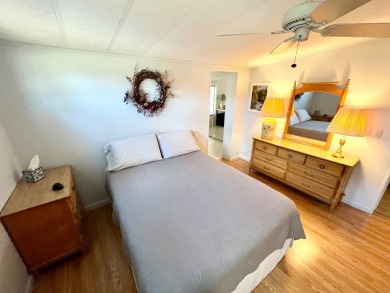 Welcome to this beautifully maintained 2-bedroom, 2-bath home in on Pine Lakes Country Club in Florida - for sale on GolfHomes.com, golf home, golf lot