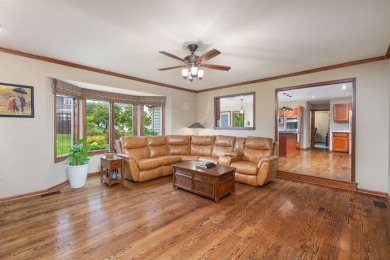 Welcome to this exquisite home nestled down a tree-lined street on White Eagle Golf Club in Illinois - for sale on GolfHomes.com, golf home, golf lot
