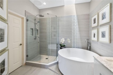 Corner end-unit, second-floor coach home filled with natural on Windstar on Naples Bay in Florida - for sale on GolfHomes.com, golf home, golf lot