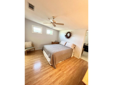 Welcome to this beautifully maintained 2-bedroom, 2-bath home in on Pine Lakes Country Club in Florida - for sale on GolfHomes.com, golf home, golf lot