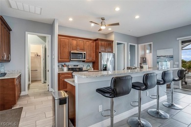 Turnkey Waterfront Pool Home on Intersecting Canal Lot | 3 Bed + on Del Tura Golf and Country Club in Florida - for sale on GolfHomes.com, golf home, golf lot