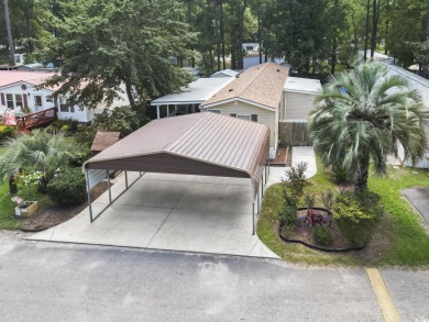 Just a short golf cart ride to the Beach, this beautifully on Indian Wells Golf Course in South Carolina - for sale on GolfHomes.com, golf home, golf lot