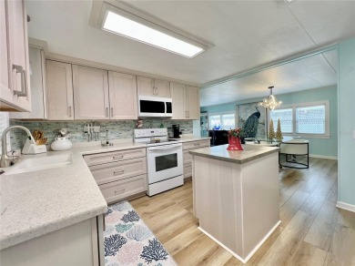 This exceptional home will captivate you from the moment you on Fairway Village Golf Course in Florida - for sale on GolfHomes.com, golf home, golf lot