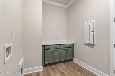 Welcome to your ideal coastal retreat! This beautiful 1.5 story on Crow Creek Golf Club in North Carolina - for sale on GolfHomes.com, golf home, golf lot