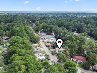 Just a short golf cart ride to the Beach, this beautifully on Indian Wells Golf Course in South Carolina - for sale on GolfHomes.com, golf home, golf lot