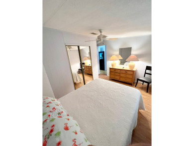 Welcome to this beautifully maintained 2-bedroom, 2-bath home in on Pine Lakes Country Club in Florida - for sale on GolfHomes.com, golf home, golf lot