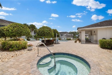 Corner end-unit, second-floor coach home filled with natural on Windstar on Naples Bay in Florida - for sale on GolfHomes.com, golf home, golf lot