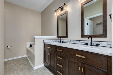 Discover this beautifully renovated three-bedroom on Leawood South Country Club in Kansas - for sale on GolfHomes.com, golf home, golf lot