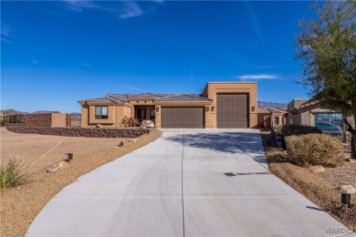 Discover this stunning, custom-built 4-bedroom home with an RV on The Refuge Golf and Country Club in Arizona - for sale on GolfHomes.com, golf home, golf lot