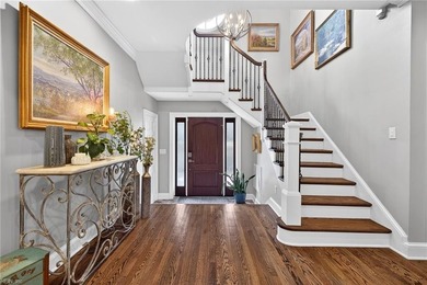 A stunning waterfront home located on .8 acres across from the on Cavalier Golf and Yacht Club in Virginia - for sale on GolfHomes.com, golf home, golf lot