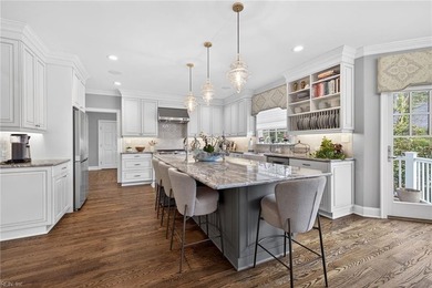 A stunning waterfront home located on .8 acres across from the on Cavalier Golf and Yacht Club in Virginia - for sale on GolfHomes.com, golf home, golf lot