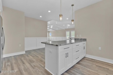 HOME IS NEARING COMPLETION FOR 8/30/25. PHOTOS ARE OF PREVIOUS on Founders Club At St. James Plantation in North Carolina - for sale on GolfHomes.com, golf home, golf lot
