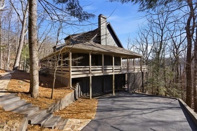 This Rustic Mountain Lodge is perfectly positioned on nearly a on Big Canoe Golf Club - Cherokee in Georgia - for sale on GolfHomes.com, golf home, golf lot