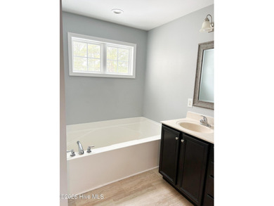 Fall in love the moment you arrive at this stunning home on Rock Creek Country Club in North Carolina - for sale on GolfHomes.com, golf home, golf lot