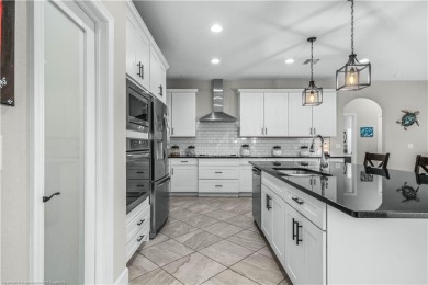 OPEN HOUSE-SUN. JUNE 1-(1:00 PM TO 3:00 P.M.) JUST REDUCED on River Greens Golf Course in Florida - for sale on GolfHomes.com, golf home, golf lot