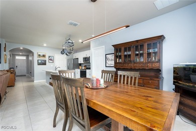 Welcome to this 2023-built home located on a premium lot backing on Herons Glen Golf and Country Club in Florida - for sale on GolfHomes.com, golf home, golf lot