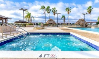 Lovely spacious 2/2 condo - 1507 sf corner unit on the golf on Flamingo Lakes Country Club in Florida - for sale on GolfHomes.com, golf home, golf lot