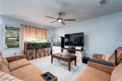 Welcome to this 2023-built home located on a premium lot backing on Herons Glen Golf and Country Club in Florida - for sale on GolfHomes.com, golf home, golf lot