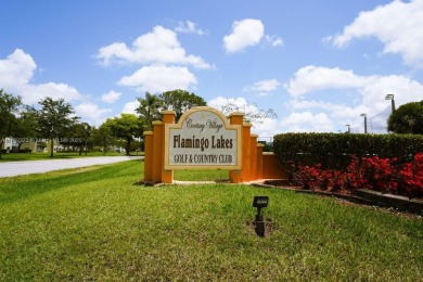 Lovely spacious 2/2 condo - 1507 sf corner unit on the golf on Flamingo Lakes Country Club in Florida - for sale on GolfHomes.com, golf home, golf lot