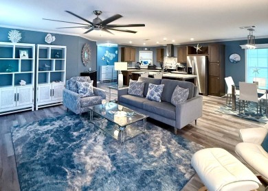 You've just discovered a REAL GEM -- a move-in ready paradise on Royal Wood Golf and Country Club in Florida - for sale on GolfHomes.com, golf home, golf lot