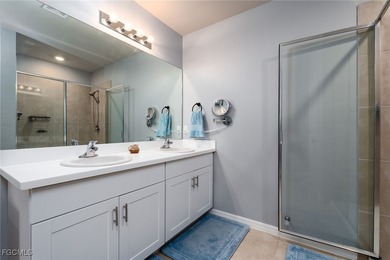 Welcome to this 2023-built home located on a premium lot backing on Herons Glen Golf and Country Club in Florida - for sale on GolfHomes.com, golf home, golf lot