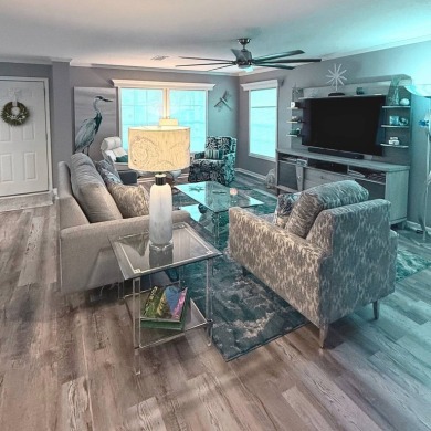 You've just discovered a REAL GEM -- a move-in ready paradise on Royal Wood Golf and Country Club in Florida - for sale on GolfHomes.com, golf home, golf lot