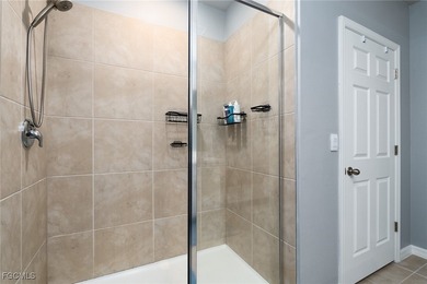 Welcome to this 2023-built home located on a premium lot backing on Herons Glen Golf and Country Club in Florida - for sale on GolfHomes.com, golf home, golf lot