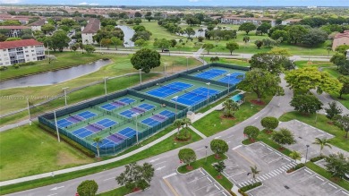 Lovely spacious 2/2 condo - 1507 sf corner unit on the golf on Flamingo Lakes Country Club in Florida - for sale on GolfHomes.com, golf home, golf lot