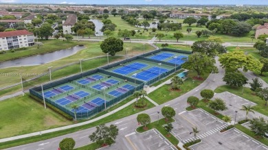Lovely spacious 2/2 condo - 1507 sf corner unit on the golf on Flamingo Lakes Country Club in Florida - for sale on GolfHomes.com, golf home, golf lot