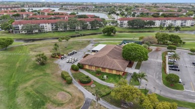 Lovely spacious 2/2 condo - 1507 sf corner unit on the golf on Flamingo Lakes Country Club in Florida - for sale on GolfHomes.com, golf home, golf lot