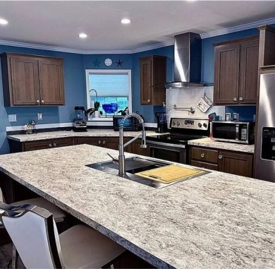 You've just discovered a REAL GEM -- a move-in ready paradise on Royal Wood Golf and Country Club in Florida - for sale on GolfHomes.com, golf home, golf lot
