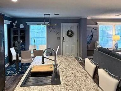 You've just discovered a REAL GEM -- a move-in ready paradise on Royal Wood Golf and Country Club in Florida - for sale on GolfHomes.com, golf home, golf lot