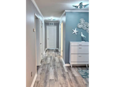 You've just discovered a REAL GEM -- a move-in ready paradise on Royal Wood Golf and Country Club in Florida - for sale on GolfHomes.com, golf home, golf lot