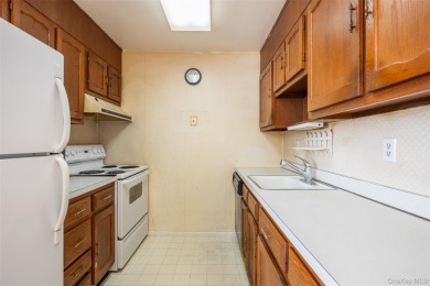 One bedroom Condo in Leisure Village's 55+ Community. This model on Leisure Village Golf Course in New York - for sale on GolfHomes.com, golf home, golf lot