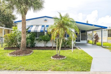 Beautiful, remodeled 2 bedroom/ 2 bathroom home with a carport on Barefoot Bay Golf Course in Florida - for sale on GolfHomes.com, golf home, golf lot