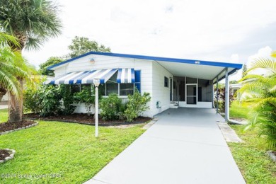 Beautiful, remodeled 2 bedroom/ 2 bathroom home with a carport on Barefoot Bay Golf Course in Florida - for sale on GolfHomes.com, golf home, golf lot