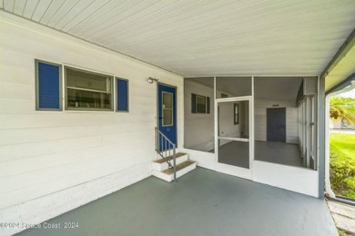 Beautiful, remodeled 2 bedroom/ 2 bathroom home with a carport on Barefoot Bay Golf Course in Florida - for sale on GolfHomes.com, golf home, golf lot