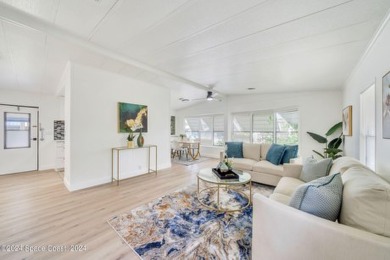 Beautiful, remodeled 2 bedroom/ 2 bathroom home with a carport on Barefoot Bay Golf Course in Florida - for sale on GolfHomes.com, golf home, golf lot