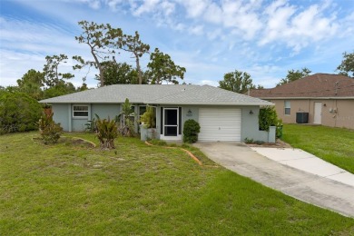 Move-in ready, fully remodeled Florida-style home on a corner on Oyster Creek Golf Club in Florida - for sale on GolfHomes.com, golf home, golf lot