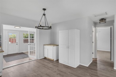 Move-in ready, fully remodeled Florida-style home on a corner on Oyster Creek Golf Club in Florida - for sale on GolfHomes.com, golf home, golf lot
