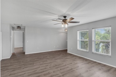 Move-in ready, fully remodeled Florida-style home on a corner on Oyster Creek Golf Club in Florida - for sale on GolfHomes.com, golf home, golf lot