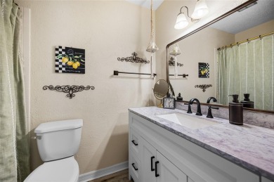 Tucked away on a quaint cul-de-sac, this WATERFRONT POOL HOME in on Duffys Golf Center in Florida - for sale on GolfHomes.com, golf home, golf lot