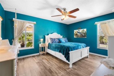 Tucked away on a quaint cul-de-sac, this WATERFRONT POOL HOME in on Duffys Golf Center in Florida - for sale on GolfHomes.com, golf home, golf lot