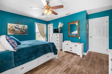 Tucked away on a quaint cul-de-sac, this WATERFRONT POOL HOME in on Duffys Golf Center in Florida - for sale on GolfHomes.com, golf home, golf lot