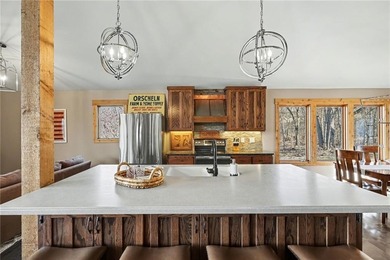 This lake front home in sought after Sugar Valley Lakes sits on on Sugar Valley Lakes Golf Course in Kansas - for sale on GolfHomes.com, golf home, golf lot