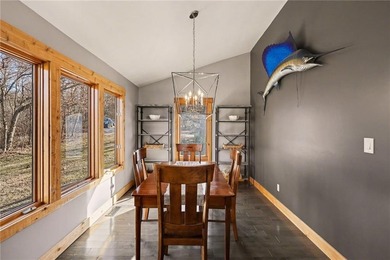 This lake front home in sought after Sugar Valley Lakes sits on on Sugar Valley Lakes Golf Course in Kansas - for sale on GolfHomes.com, golf home, golf lot